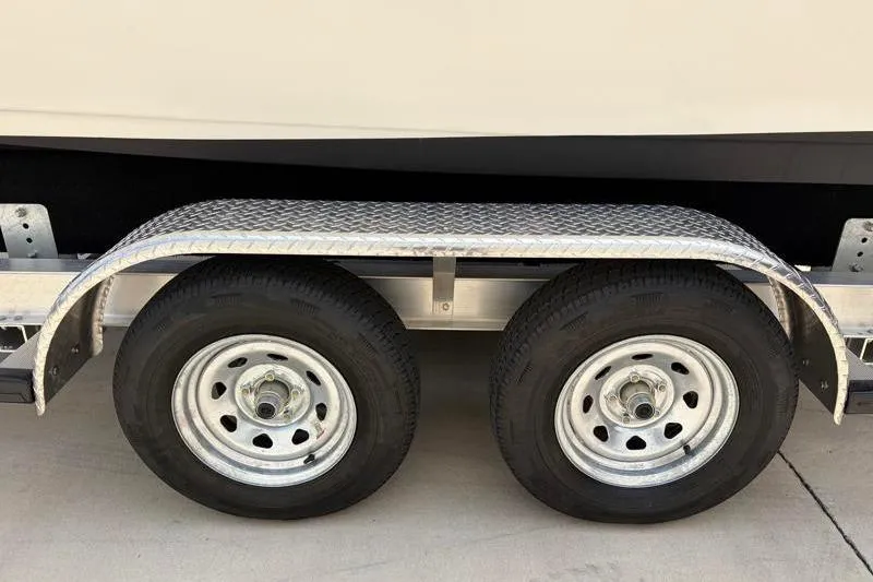 Slide: The Image of 2024 Key West 203 FS trailer with dual wheels and diamond plate fender. - 46