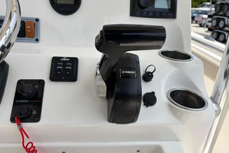 Slide: The Image of 2024 Key West 203 FS boat console with Yamaha controls and cup holders. - 34
