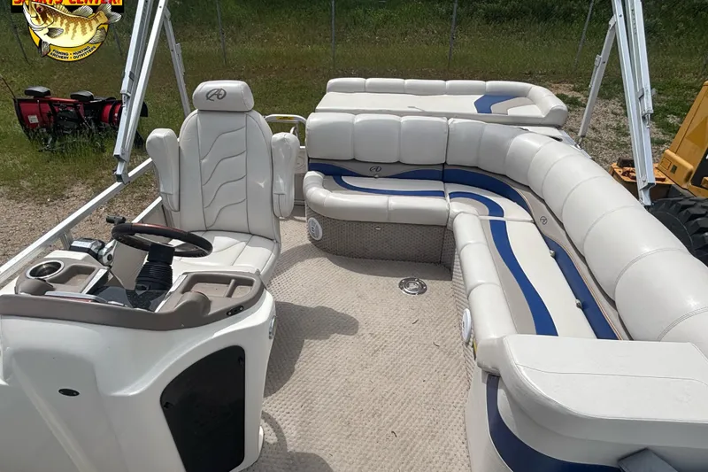 Slide: The Image of 2008 Avalon Paradise 20' pontoon boat interior with white and blue seating. - 5