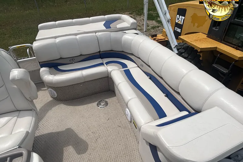 Slide: The Image of 2008 Avalon Paradise 20' pontoon boat interior with white and blue seating. - 8