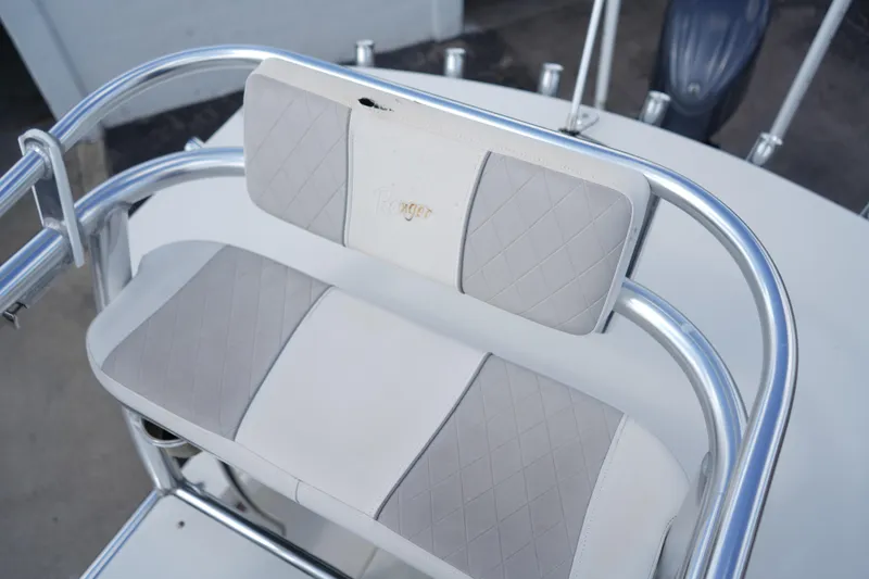 Slide: The Image of 2021 Ranger 2600 Bay boat seat with quilted upholstery and metal frame. - 17