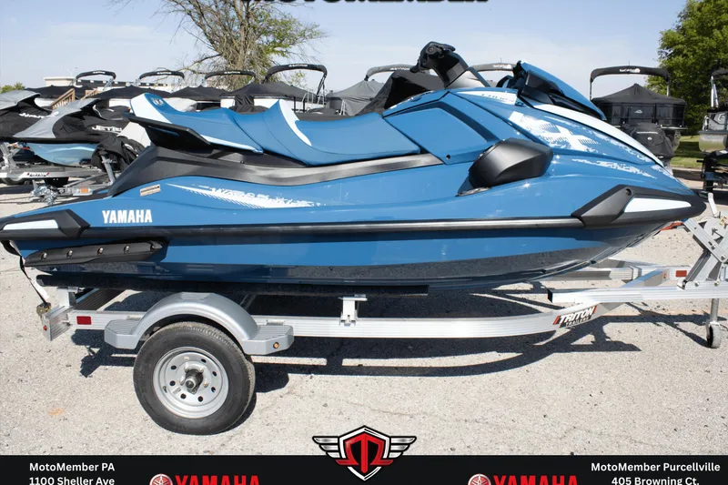 The Image of 2026 Yamaha WaveRunner VX Cruiser in blue on a trailer, displayed outdoors. - 0