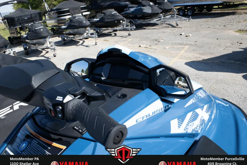 Slide: The Image of 2026 Yamaha WaveRunner VX Cruiser in a dealership lot, showcasing handlebars and mirrors. - 7