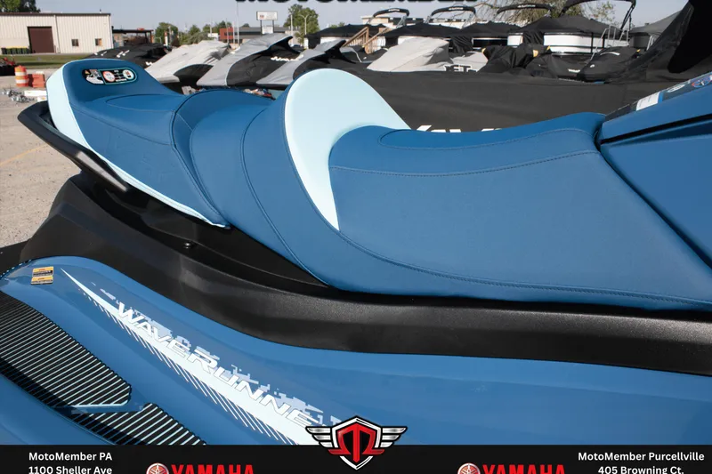 Slide: The Image of 2026 Yamaha WaveRunner VX Cruiser with blue seating, showcased outdoors. - 8