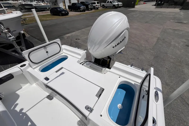 Slide: The Image of Tidewater 2300 Carolina Bay 2026 with Yamaha engine, rear view. - 16