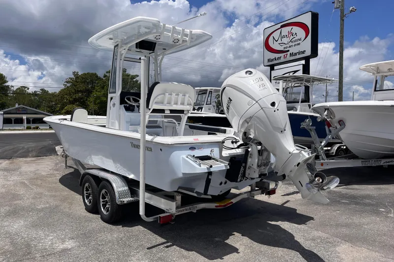 Slide: The Image of 2026 Tidewater 2300 Carolina Bay boat on trailer. - 2