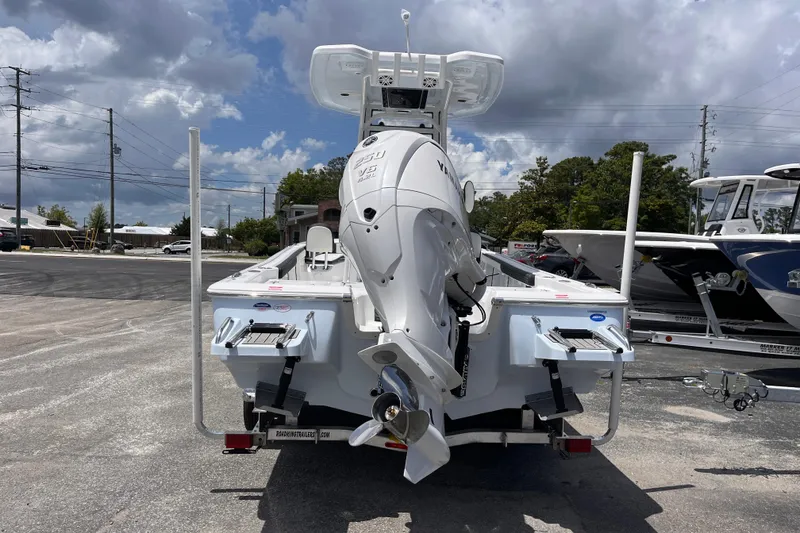 Slide: The Image of 2026 Tidewater 2300 Carolina Bay boat with outboard motor. - 3