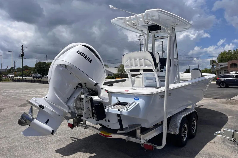 Slide: The Image of 2026 Tidewater 2300 Carolina Bay boat with Yamaha engine on trailer. - 4