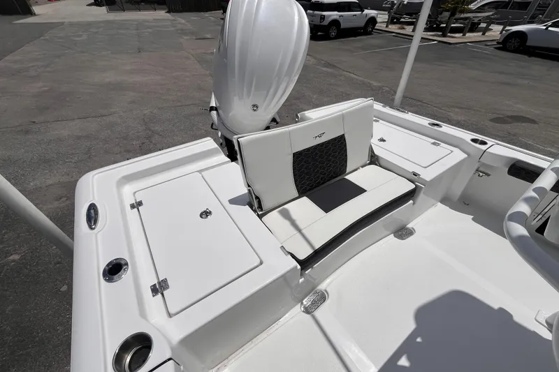 Slide: The Image of Tidewater 2300 Carolina Bay 2026, boat seating and storage area. - 6