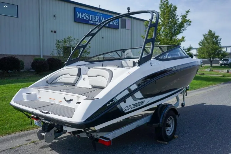Slide: The Image of 2019 Yamaha AR190 boat on trailer outside Master Marine dealership. - 3
