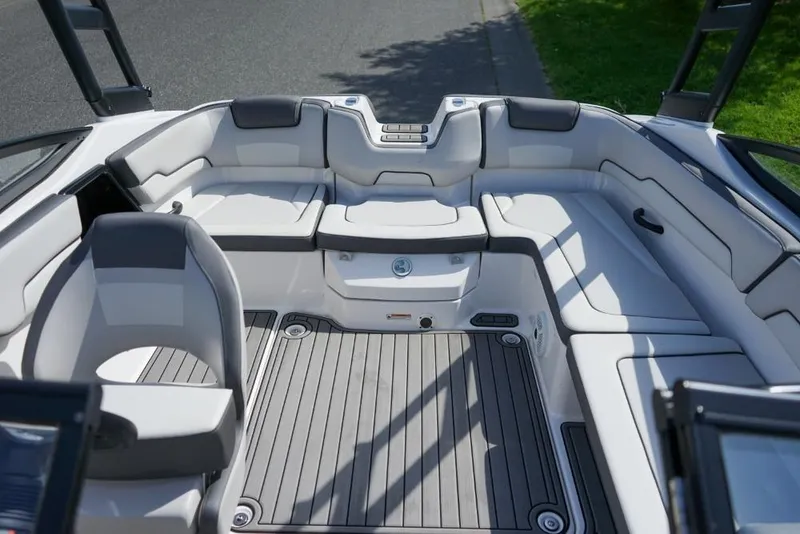 Slide: The Image of 2019 Yamaha Boats AR190 interior with spacious seating and sleek design. - 8