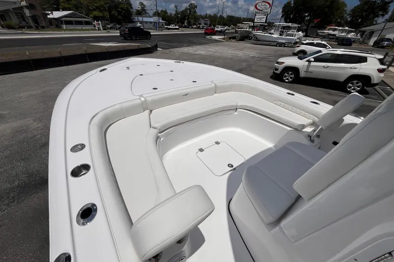Slide: The Image of 2026 Tidewater 2500 Carolina Bay boat with spacious seating and sleek design. - 11