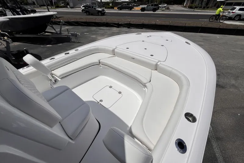 Slide: The Image of 2026 Tidewater 2500 Carolina Bay boat with spacious seating and sleek design. - 9