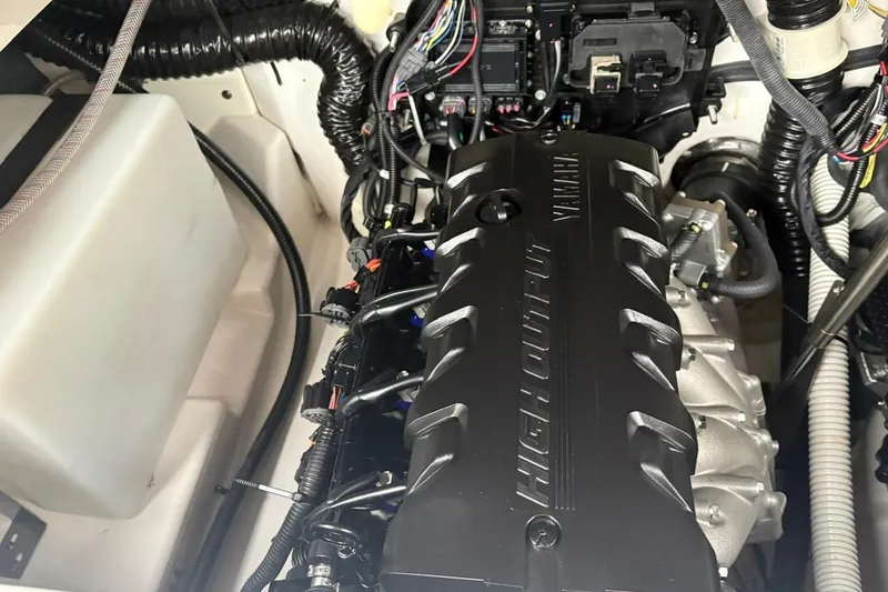 Slide: The Image of 2023 Yamaha Boats 252SD engine compartment showcasing high output engine components. - 10
