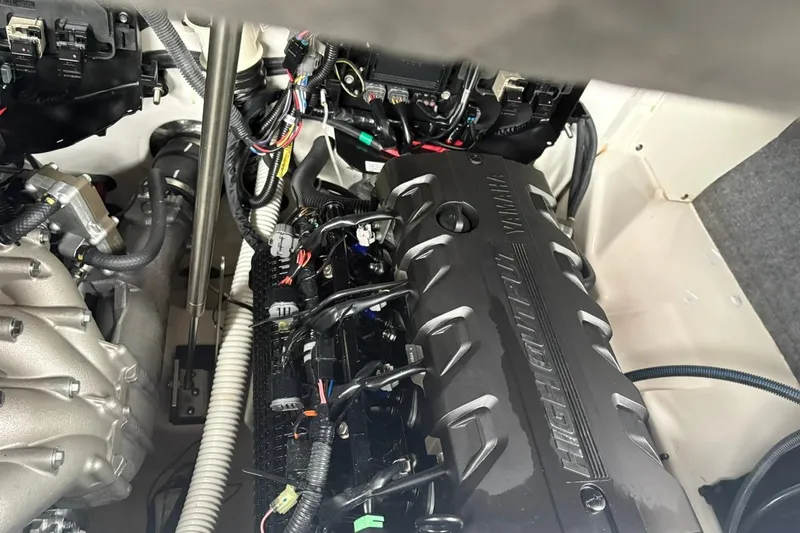 Slide: The Image of 2023 Yamaha Boats 252SD engine compartment showcasing advanced mechanics and wiring. - 9