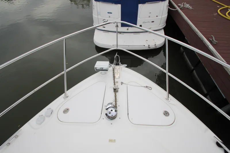 Slide: The Image of Bow view of 2007 Sea Ray 44 Sundancer docked at marina. - 10