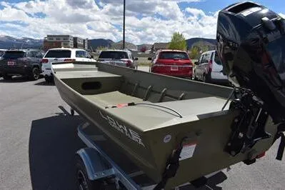 Slide: The Image of 2024 Lowe L1648M Aura Jon boat on trailer in parking lot. - 5