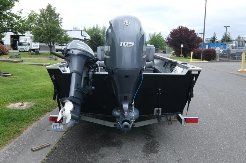 Slide: The Image of 2021 Alumaweld Super Vee 20 boat with dual Yamaha outboard motors on a trailer. - 4
