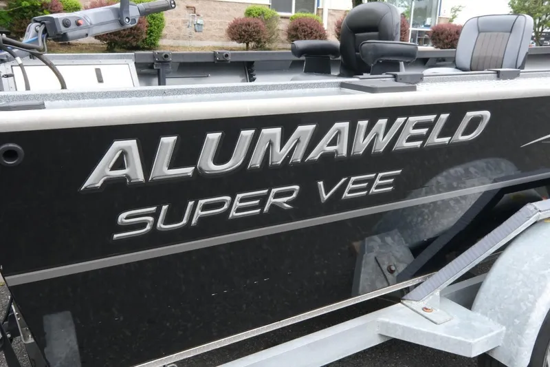 Slide: The Image of 2021 Alumaweld Super Vee 20 boat side view with logo and seating. - 6