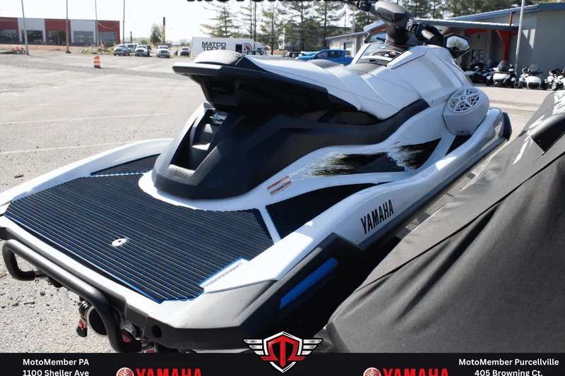Slide: The Image of 2026 Yamaha WaveRunner VX Deluxe in a dealership parking lot, showcasing sleek design. - 4