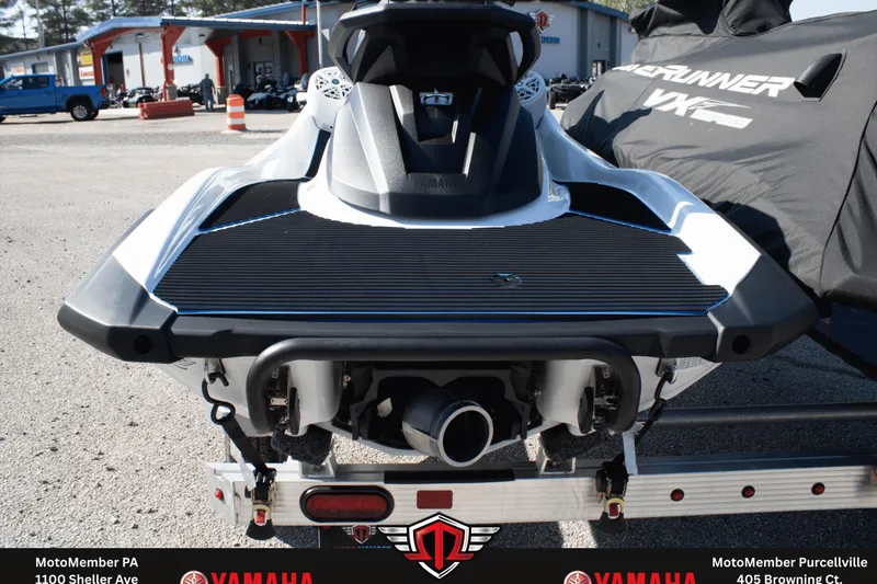 Slide: The Image of 2026 Yamaha WaveRunner VX Deluxe on trailer, rear view in outdoor setting. - 5