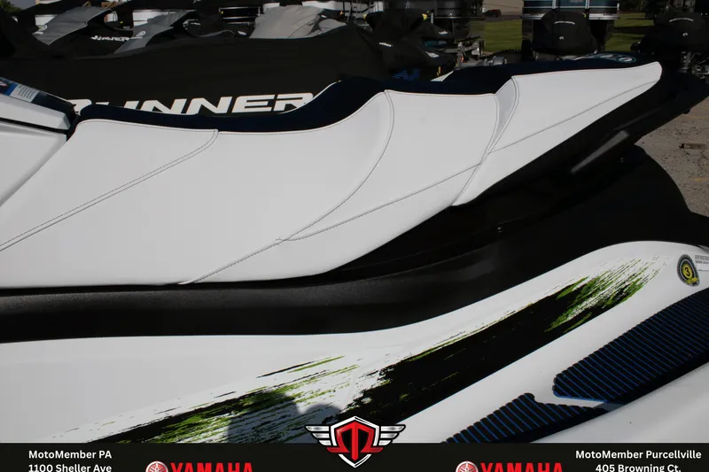 Slide: The Image of 2026 Yamaha WaveRunner VX Deluxe with sleek white seating and dynamic design accents. - 8