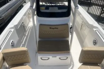 Slide: The Image of 2023 Trophy T22 boat interior with beige seating and modern design. - 10