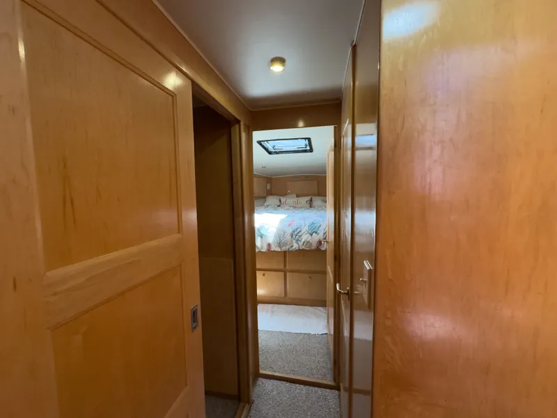 Slide: The Image of Interior of a 1999 Navigator 5300 yacht with wooden finish. - 19