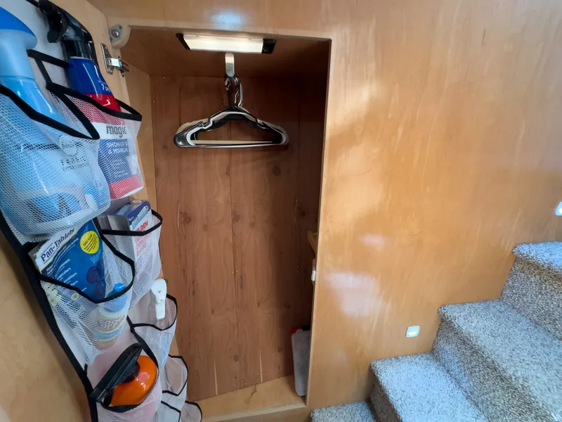 Slide: The Image of Storage area in 1999 Navigator 5300 with cleaning supplies. - 20
