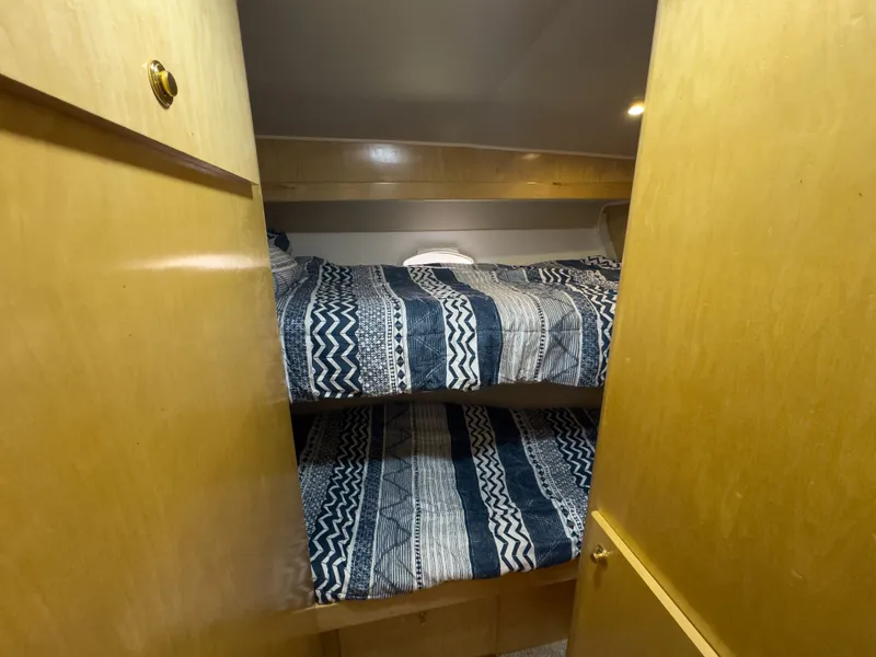 Slide: The Image of Interior of 1999 Navigator 5300 with bunk beds. - 23