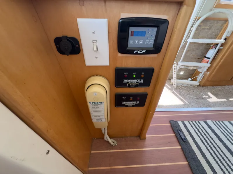 Slide: The Image of Interior view of a 1999 Navigator 5300 with control panel. - 26
