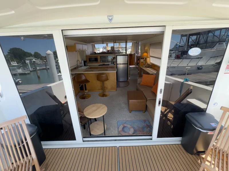 Slide: The Image of Interior of a 1999 Navigator 5300 yacht at the marina. - 37