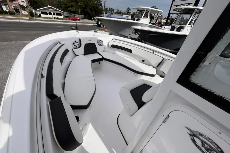 The Image of 2026 Tidewater 220 LXF boat interior with sleek seating and modern design. - 10