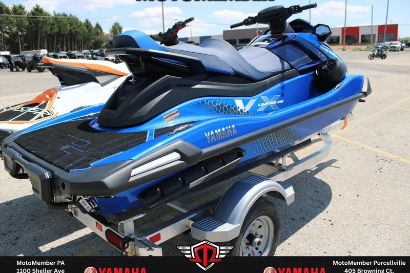 Slide: The Image of 2026 Yamaha WaveRunner VX Limited HO on trailer, blue color, parked outdoors. - 6