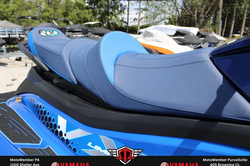 Slide: The Image of 2026 Yamaha WaveRunner VX Limited HO with blue seating, showcased outdoors. - 8