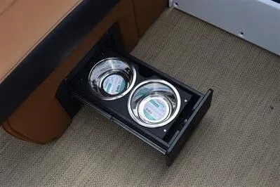 Slide: The Image of Built-in cup holders on the 2026 Princecraft Vouge 25 RL boat, featuring a sleek design. - 19
