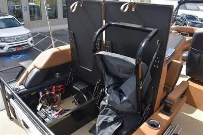 Slide: The Image of 2026 Princecraft Vogue 25 RL boat interior with seating and storage compartments. - 24