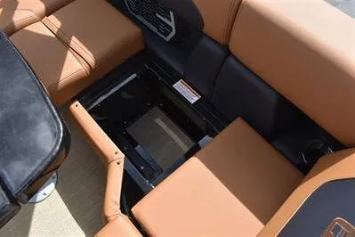 Slide: The Image of 2026 Princecraft Vouge 25 RL boat interior seating with storage compartment. - 29