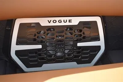 Slide: The Image of 2026 Princecraft Vogue 25 RL grille with hexagonal design and bold "Vogue" branding. - 30