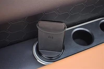 Slide: The Image of Cup holder and wireless charger in 2026 Princecraft Vouge 25 RL boat interior. - 31
