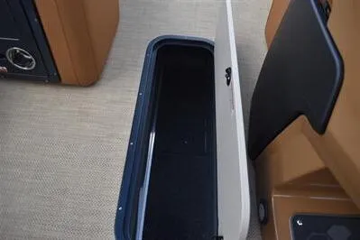 Slide: The Image of Storage compartment in 2026 Princecraft Vogue 25 RL boat interior. - 35
