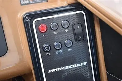 Slide: The Image of Control panel of 2026 Princecraft Vogue 25 RL boat with labeled buttons. - 39