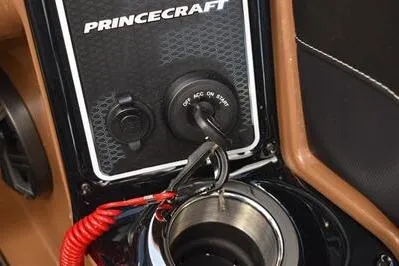 Slide: The Image of 2026 Princecraft Vouge 25 RL ignition panel with key and safety lanyard. - 40