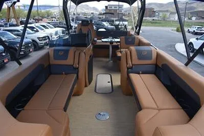 Slide: The Image of 2026 Princecraft Vogue 25 RL pontoon boat with luxurious seating and modern design. - 50