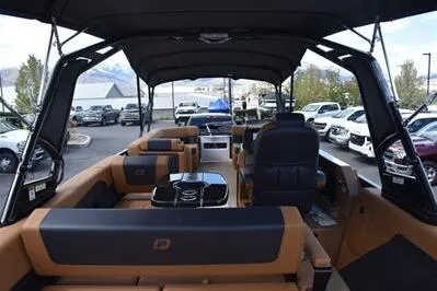 Slide: The Image of 2026 Princecraft Vogue 25 RL pontoon boat interior with luxurious seating and modern design. - 51