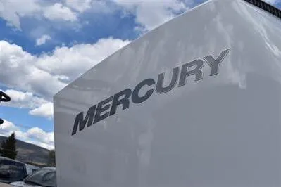 Slide: The Image of 2026 Princecraft Vouge 25 RL with Mercury engine under a cloudy sky. - 6