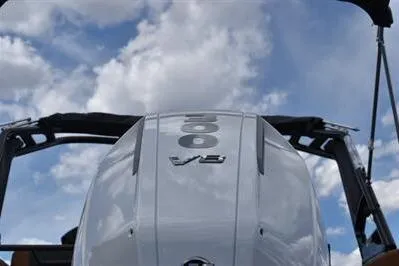 Slide: The Image of 2026 Princecraft Vouge 25 RL boat engine against a cloudy sky backdrop. - 7