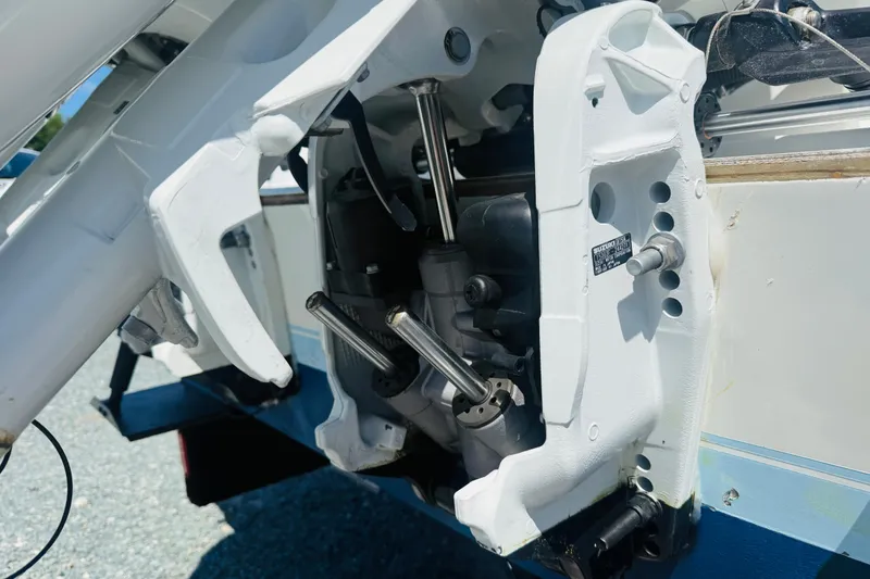 Slide: The Image of Close-up of a 1996 Contender 23 CC boat engine mount, showcasing mechanical details. - 6