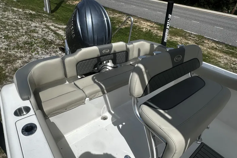 Slide: The Image of 2026 Key West 203 FS boat interior with cushioned seating and sleek design. - 8