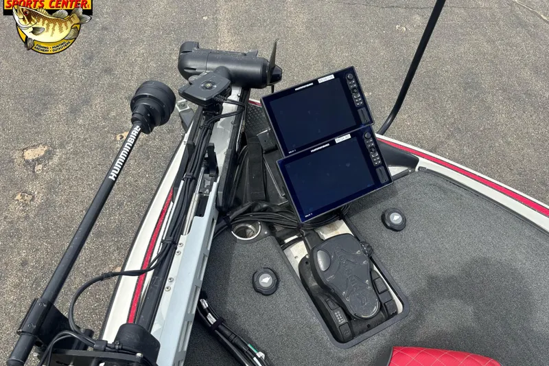 Slide: The Image of 2018 Triton 20 TrX boat dashboard with dual Humminbird fish finders and trolling motor. - 10